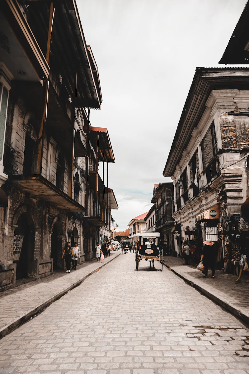 A stone street lined with old houses in Vigan